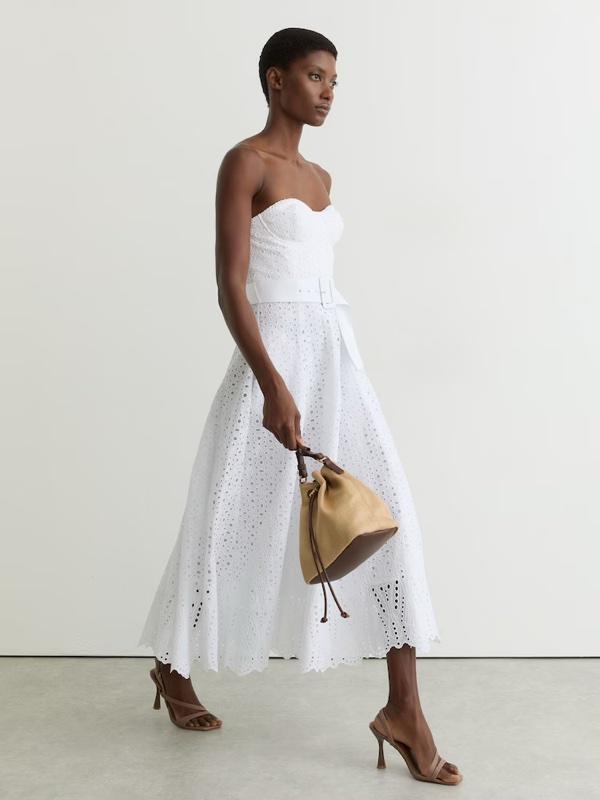 Embroidered linen dress for a summer civil ceremony