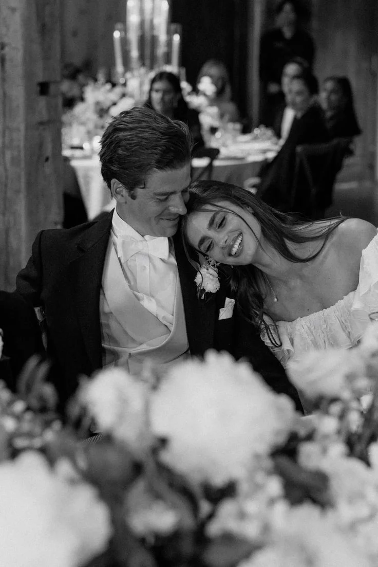 Bride leaning on groom's shoulder during romantic mr and mrs quiz moment